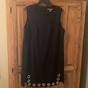 Karl Lagerfield sleeveless black dress with gold grommet accent. Size 16